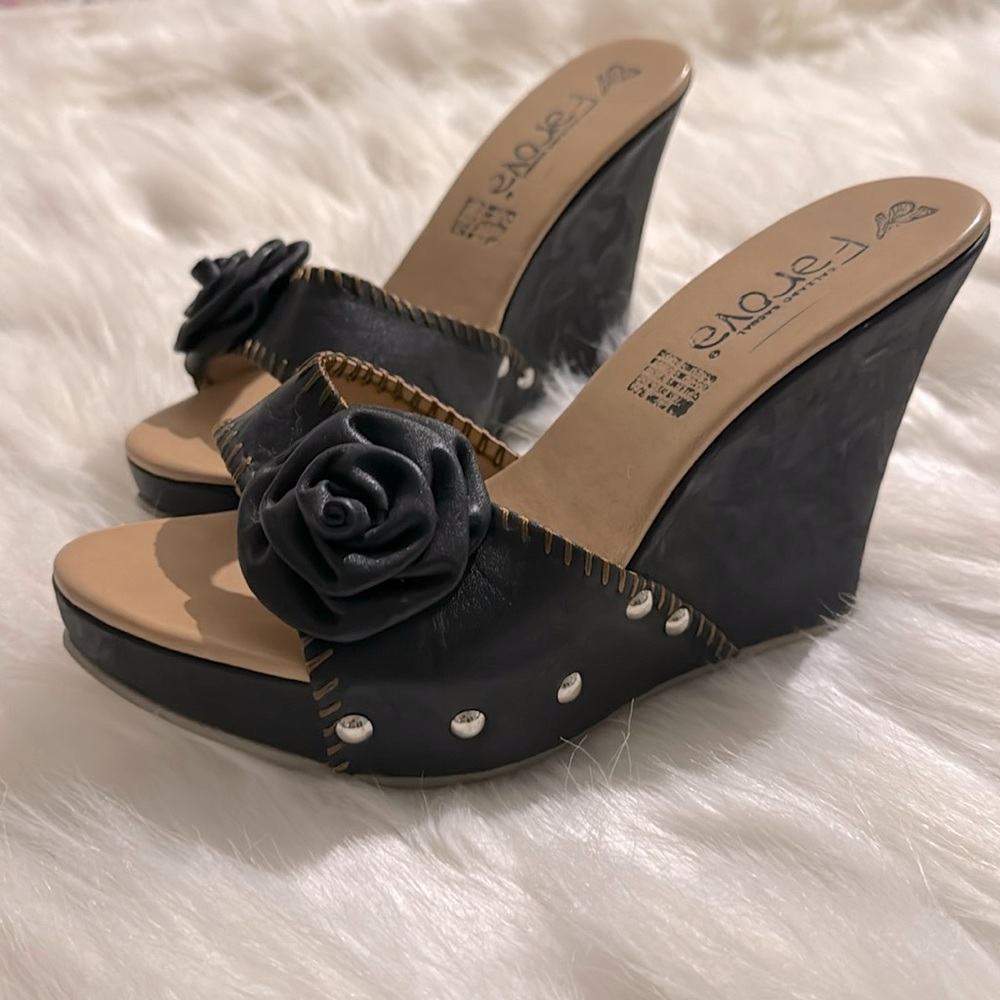 Black mules with rose